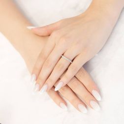 Photo of worn Platinum and 32 Diamonds 2.30mm Twist Eternity Ring - size 12