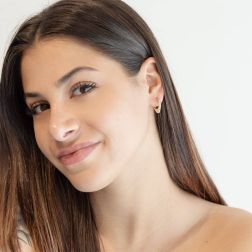 Photo of worn Yellow Gold Drop Shaped Hoops with Zircons