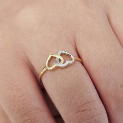 Photo of worn Ring with 2 Perforated Hearts in Yellow Gold and White Gold
