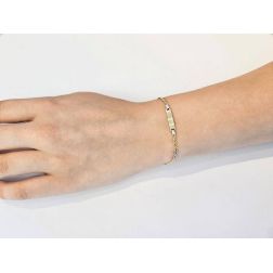 Photo of worn Yellow and White Gold Tiger and Partridge Link Tag Bracelet