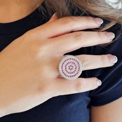 Photo of worn Spiral Design Ring with Rubies and Diamonds