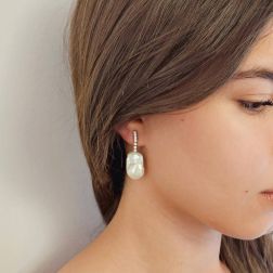 photo of worn Tennis-style drop earrings with Fresh Water Baroque Pearls and 14 Diamonds