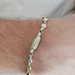 Photo of worn D&R bracelet in White and Yellow Gold