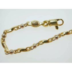 Bracciale maglia Torchon e palline in Oro Giallo e Bianco