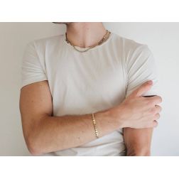 Photo of worn Disc sequin bracelet in white and yellow gold