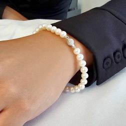 photo of worn Pearl Bracelete with sparkle ball clasp in 18kt white gold