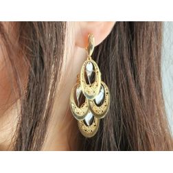 Photo of worn Yellow and white gold holed ovals pendant earrings