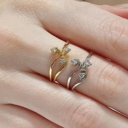 Photo of worn three bands Trilogy Flower ring in Yellow Gold and Diamonds
