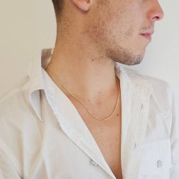 Photo of worn 50cm x 2.50mm Yellow Gold Cuban Link and Partridge Chain Necklace