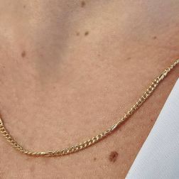 Photo of worn 50cm x 2.50mm Yellow Gold Cuban Link and Partridge Chain Necklace