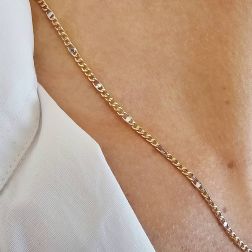 Photo of worn 5+1 curb chain and crossbar necklace 50cm x 2.50mm in 18kt two-tone