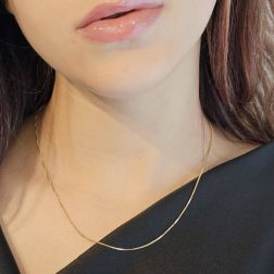 Photo of worn Necklace Veneta 0.9mm 18kt yellow gold