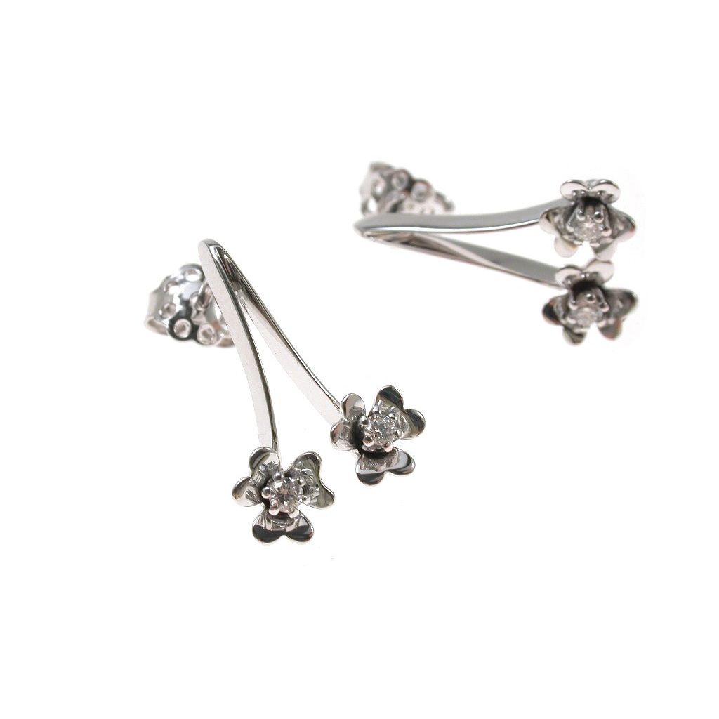 Double Flowers earrings with diamonds
