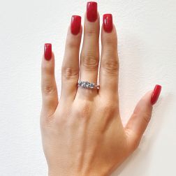 photo of worn Aquamarine Trilogy Ring in White Gold