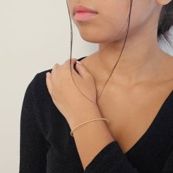 Bracciale Rigido aperto a Palline in Oro Giallo foto indossata