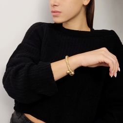 Photo of worn Rigid bracelet spiral with 2 spheres in yellow, white and rose gold