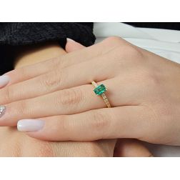 photo of worn Solitaire Ring with Octagonal Emerald and 8 Diamonds