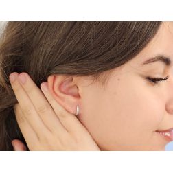 Photo of worn White Gold 1.2cm x 2.3mm Round Lobe Hoops with Zircons