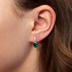 Photo of worn Emerald 9mm x 6.8mm and Diamond Earrings