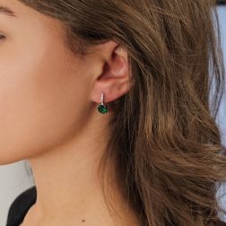 Photo of worn Emerald 9mm x 6.8mm and Diamond Earrings