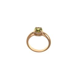 Round Solitaire Ring with Peridot and 18 Diamonds in Rose Gold