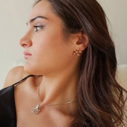 Photo of worn Starfish Earrings with Rhodolites, Yellow Topaz, Mandarin and Yellow Sapphires on Rose Gold