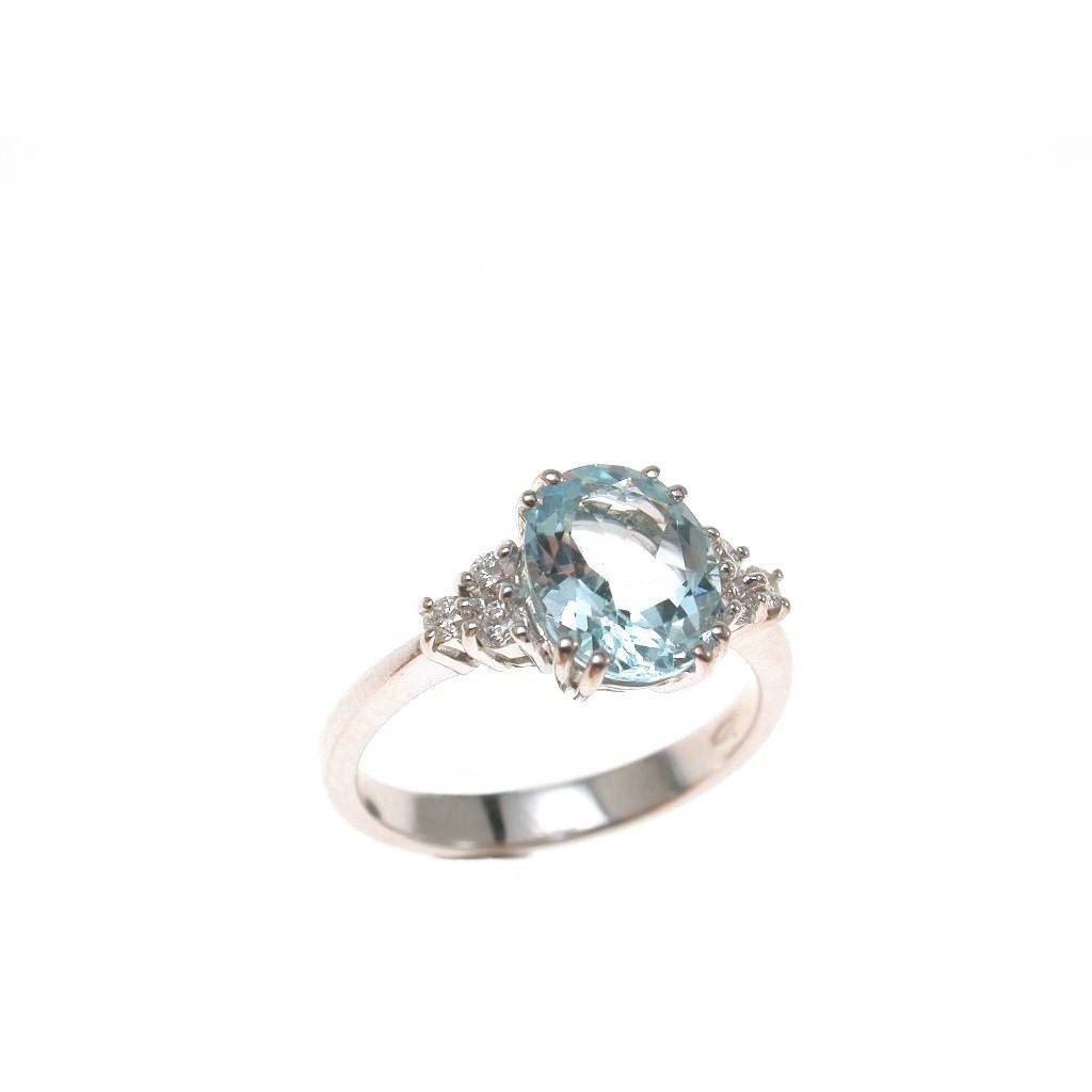 Solitaire Ring with Aquamarine 10mmx8mm and Diamonds