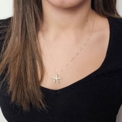Photo of worn Starfish Pendant with Yellow and Brown Diamonds in Rose Gold