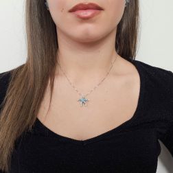 Photo of worn Starfish Pendant with Blue Diamonds in White Gold