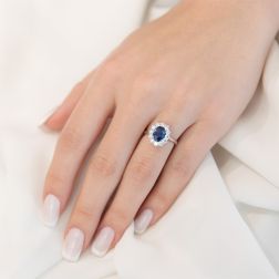 Photo of worn 6x8 Blue Sapphire with 12 Diamonds Kate Ring