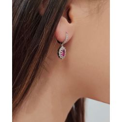 Photo of worn Kate Ruby Earrings 6x5mm and 38 Diamonds