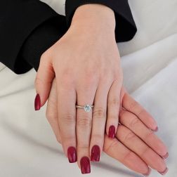 Photo of worn Suspended Solitaire Aquamarine 7mm in 18kt White Gold