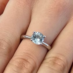 Photo of worn Suspended Solitaire Aquamarine 7mm in 18kt White Gold