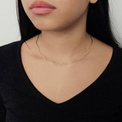 Photo of worn Semi-rigid flexible wave necklace