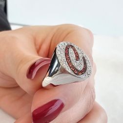 Photo of worn Letter C Chevalier Ring with Mandarin Sapphires and Diamonds