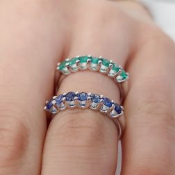 Photo of worn Veretta Ring with 7 Blue Sapphires Suspended in White Gold