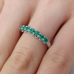 Photo of worn Veretta 7 Emeralds suspended 3mm ring in White Gold