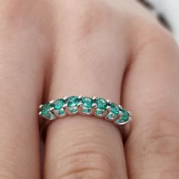 Photo of worn Veretta 7 Emeralds suspended 3mm ring in White Gold