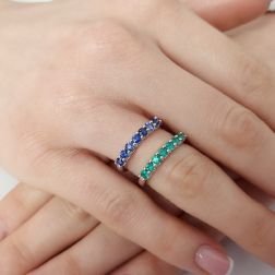 Photo of worn Veretta 7 Emeralds suspended 3mm ring in White Gold