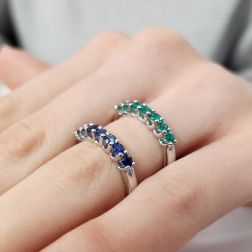 Photo of worn Veretta 7 Emeralds suspended 3mm ring in White Gold