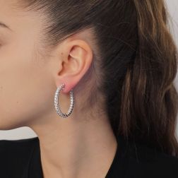 Photo of worn Hoops with 58 diamonds 5.36ct clip closure in white gold