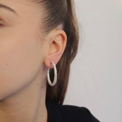 Photo of worn Hoops with 58 diamonds 5.36ct clip closure in white gold