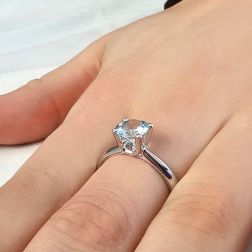 Photo of worn Suspended Solitaire Aquamarine 7mm in 18kt White Gold