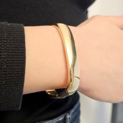 Photo of worn Large Square Rigid Bracelet in Polished Yellow Gold