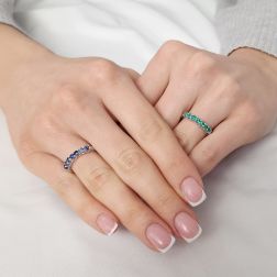 Photo of worn Veretta 7 Emeralds suspended 3mm ring in White Gold