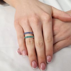 Photo of worn Veretta 7 Emeralds suspended 3mm ring in White Gold