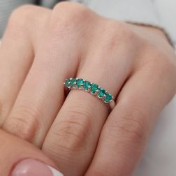 Photo of worn Veretta 7 Emeralds suspended 3mm ring in White Gold