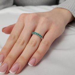 Photo of worn Veretta 7 Emeralds suspended 3mm ring in White Gold