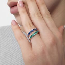 Photo of worn Veretta Ring with 7 Blue Sapphires Suspended in White Gold