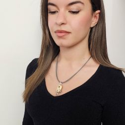 photo of worn Satin-finish Egg pendant in Yellow Gold and Diamonds